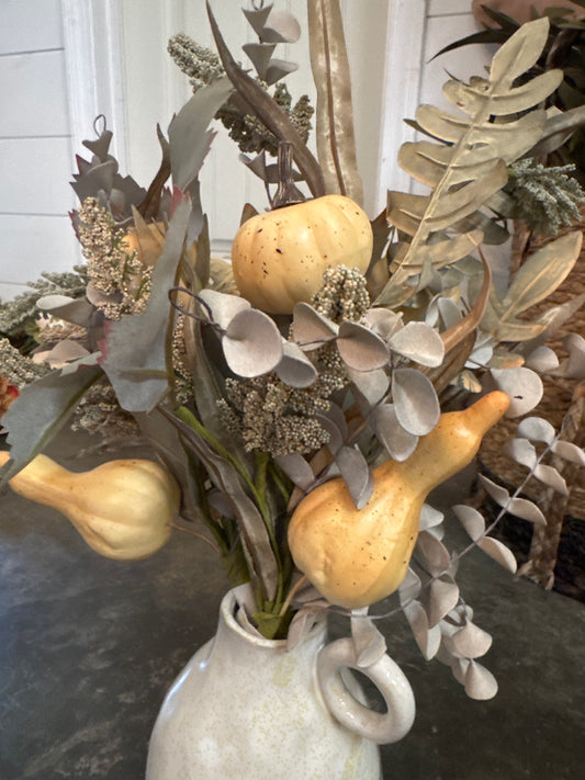 Muted mixed greens squash stem